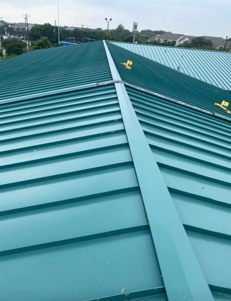 Green commercial metal roof ridge and valley for Metal Roof Repair in Cicero