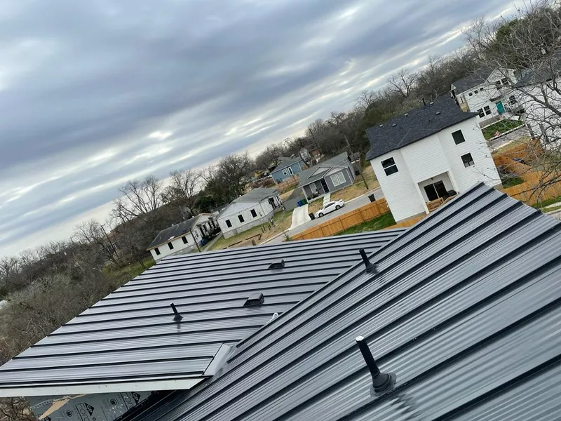 Standing seam metal roof panels with vents for Skylight Repair in Cicero